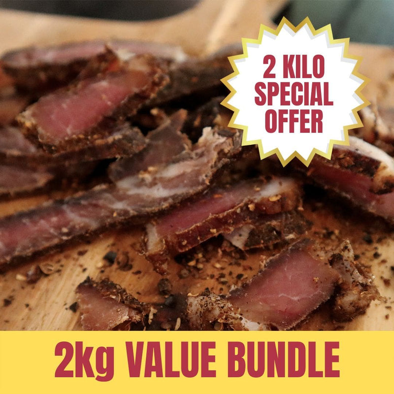 2 Kilo Special Offer Biltong wooden board with a '2 Kilo Special Offer' label.