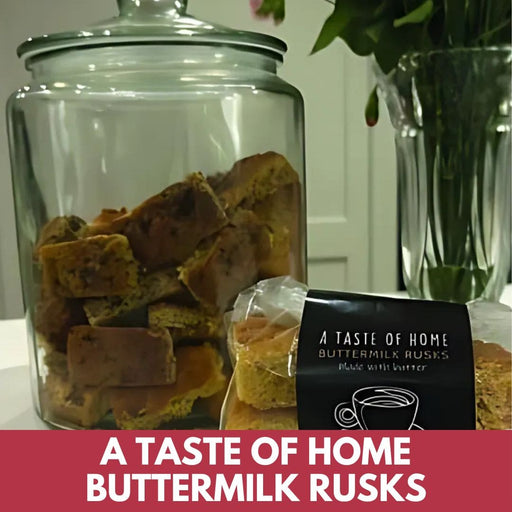 Jar of buttermilk rusks with a package labeled 'A Taste of Home Buttermilk Rusks' on a white surface.
