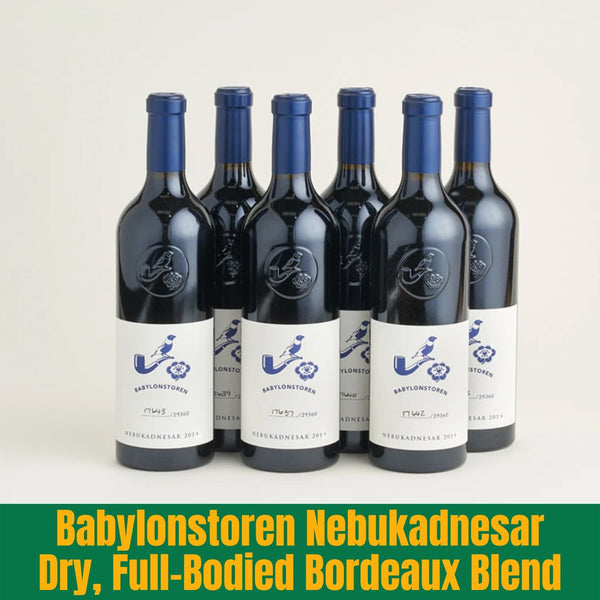 Six bottles of Babylonstoren Nebukadnesar wine with blue labels on a white background.