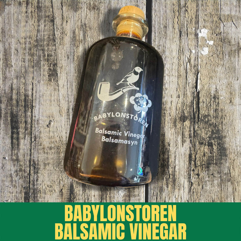 Bottle of Babylonstoren Balsamic Vinegar on a wooden surface