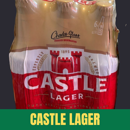 A six-pack of Castle Lager beer in a clear plastic wrap, showing the red and white label with the castle logo, plus a green banner at the bottom with yellow text reading 'CASTLE LAGER'.