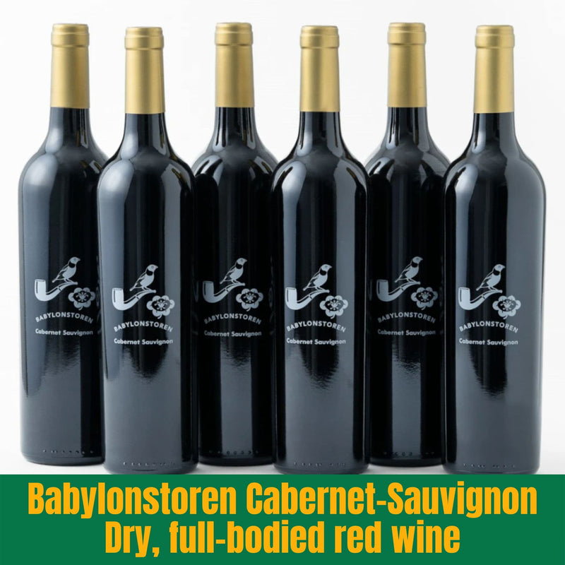 Six bottles of Babylonstoren Cabernet Sauvignon wine on a white background with product description text.