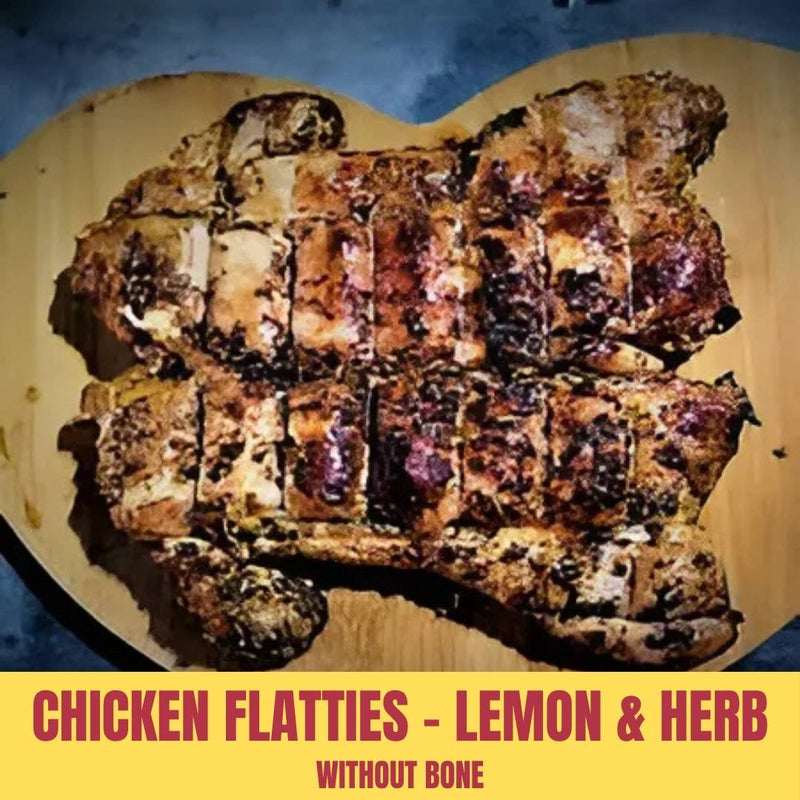 Chicken flatties with lemon and herb seasoning on a wooden board, labeled as gluten-free.