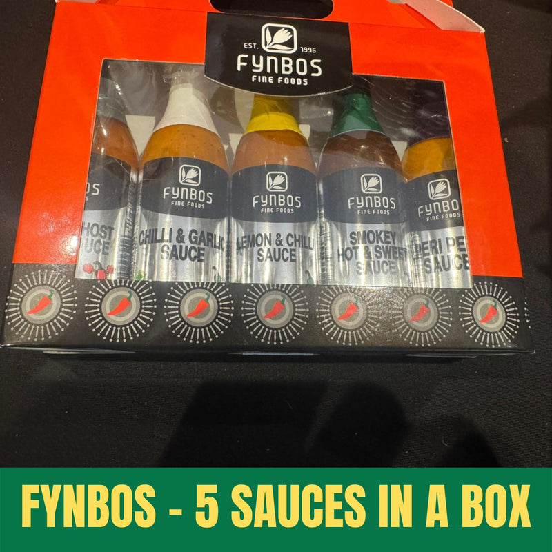 Packaged set of Fynbos sauces with visible branding on a dark background