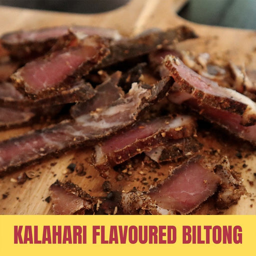 Sliced Kalahari flavoured biltong on a wooden board with text overlay.