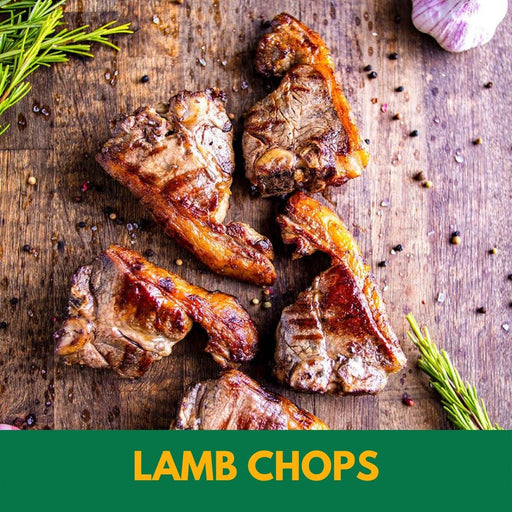 Grilled lamb chops on a wooden cutting board with herbs and garlic, labeled 'Lamb Chops'.