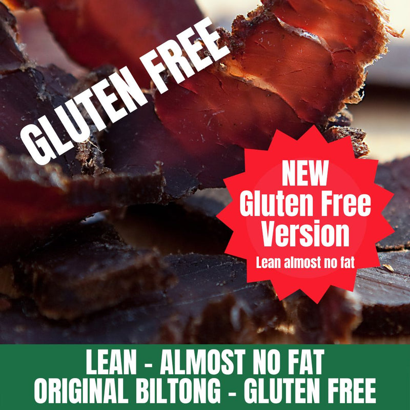 Biltong with gluten-free label and promotional text on a dark background saying Lean almost no fat original biltong