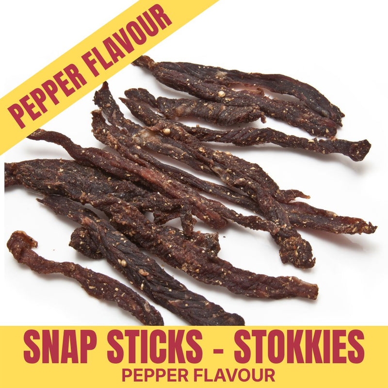 Pepper-flavored snap sticks on a white background with yellow text overlay.