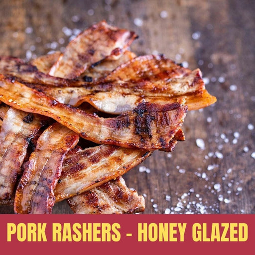 Honey glazed pork rashers on a wooden surface with text overlay.